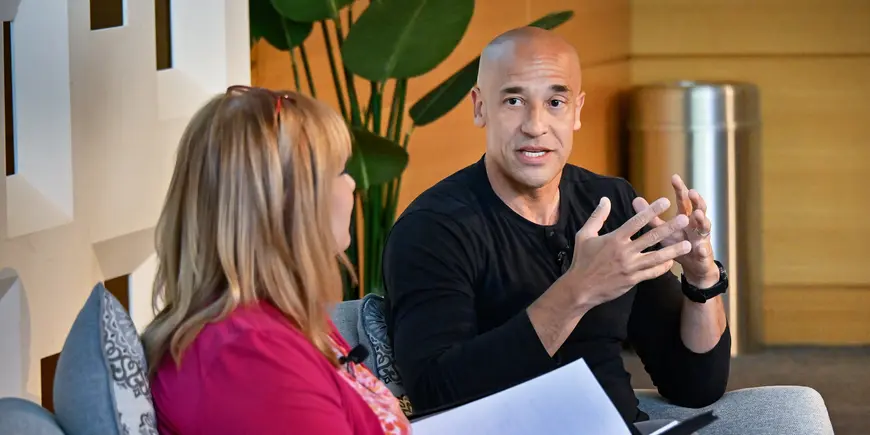 Marcus Wilson speaks with Interim Dean Perakis at MIT Sloan Reunion 2024.