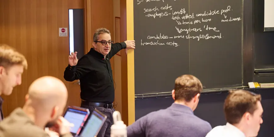 Pierre Azoulay lectures to a classroom. 