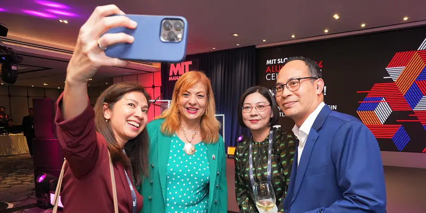 A group poses for a photo