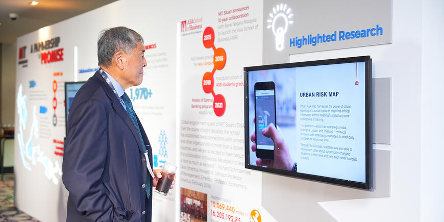 A man reads a display