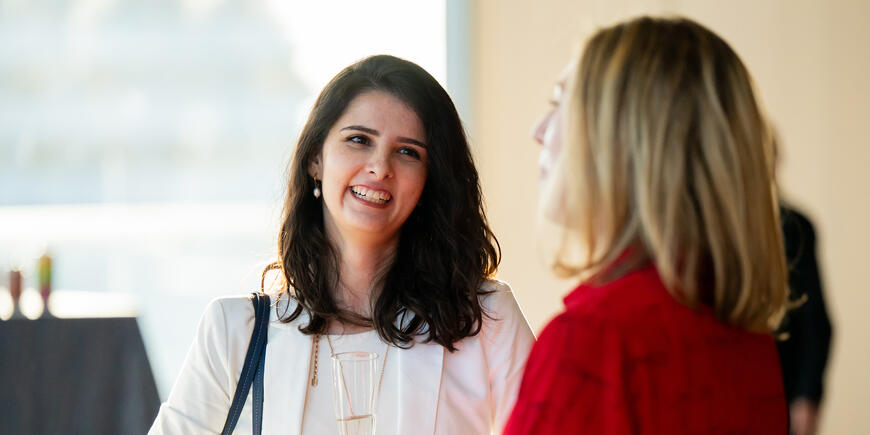 Two women speaking