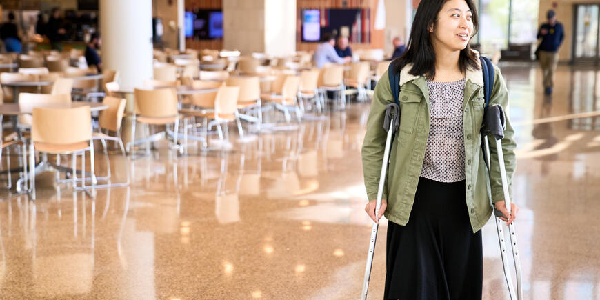 Megan Hung walks through the MIT Sloan building. 