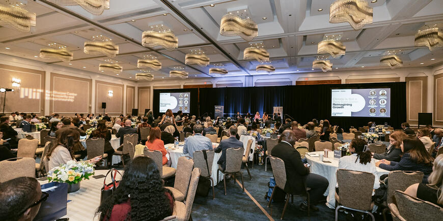 Wide shot of full conference hall