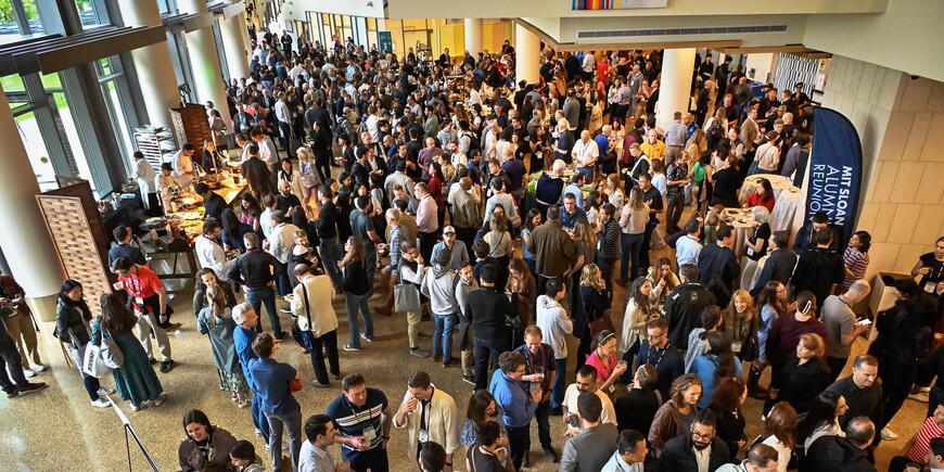 A large party convenes in a lobby