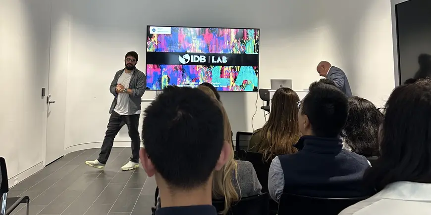 students watching a presentation at the IDB Lab