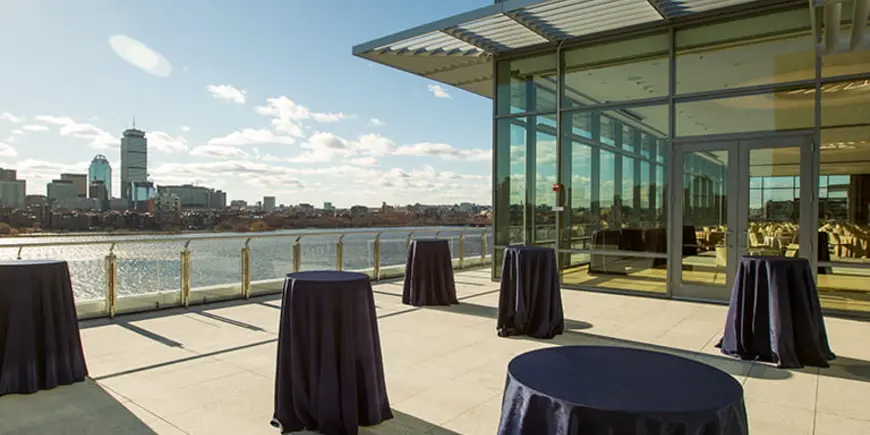 View of the Samberg Conference Center along the Charles River and across the Boston skyline.