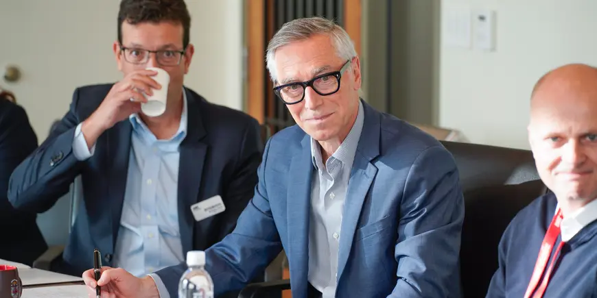 From left: Rodrigo Verdi, MIT; Richard Locke, MIT; Christian Klose, Assured Guaranty