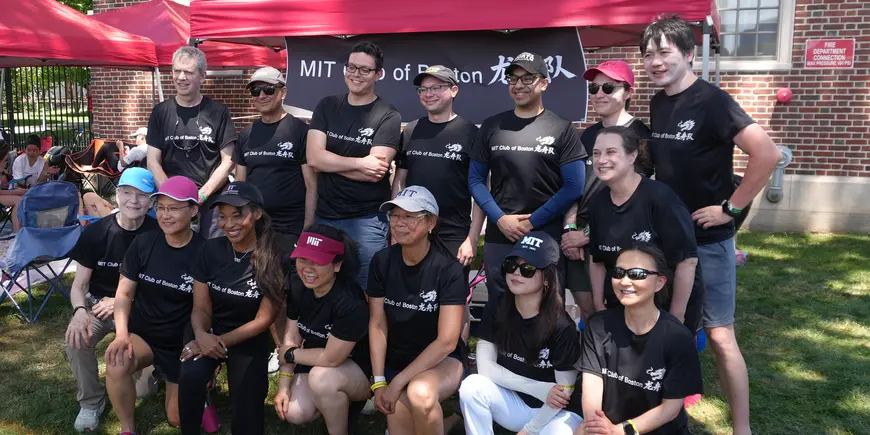 Group of people pose for photo