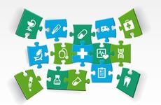 Partially connected puzzle pieces with healthcare images such as ambulance, microscope, provider, heartrate chart