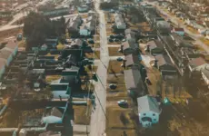 The Last Mile of Monetary Policy: Inattention, Reminders, and the Refinancing Channel