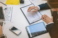 What Drives Investors' Portfolio Choices? Separating Risk Preferences from Frictions