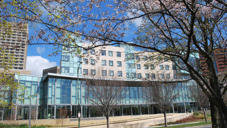 MIT Sloan exterior building E62 springtime