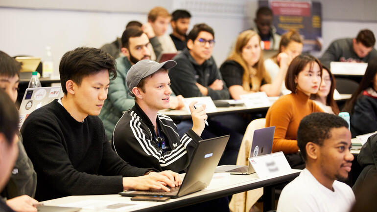 MIT Sloan finance students in classroom