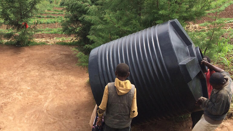 March 25, 2015. Gicumbi, Rwanda. Water tank installation.
