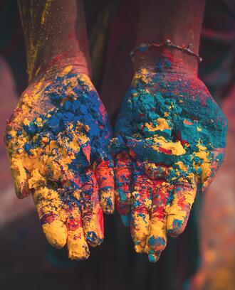 Woman holding color soils
