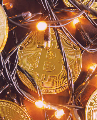 bitcoin entwined with lights