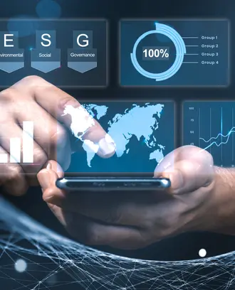ESG data, graphs, and maps superimposed over man holding smartphone 