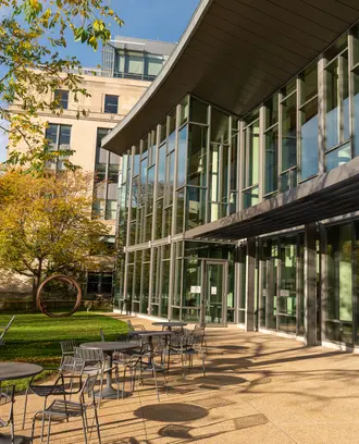 Back of MIT Sloan building on a sunny fall day