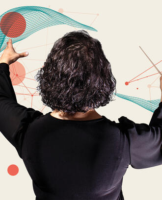 presentation level data A maestro is in front of various technological graphics