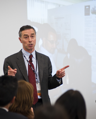 Image of Richard M. Locke making a presentation