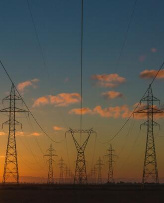 Power lines as the sun is getting ready to set