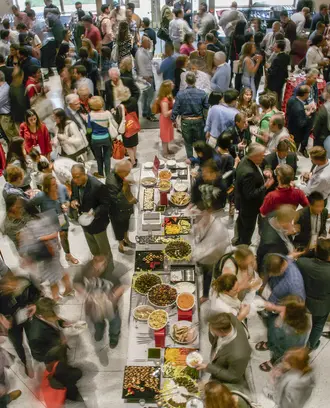 A time lapse of a large group of people at an event