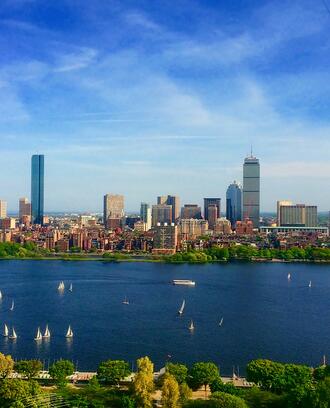 Image of the Boston skyline as seen from across the river in Cambridge