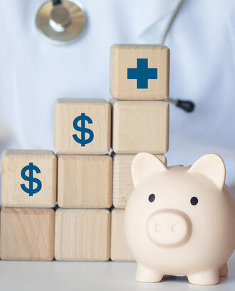 Doctor with piggybank