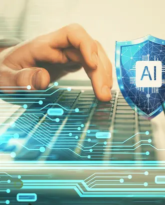 A person types on a computer with an AI cybersecurity shield