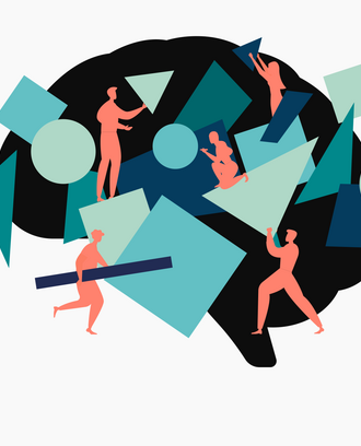a team of people hold geometric shapes to assemble something in the silhouette of a brain