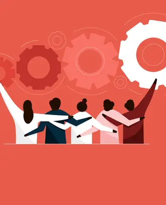 A team embraces each other in front of cogwheels