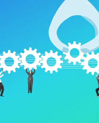 A group of workers lifts and pushes cogwheels