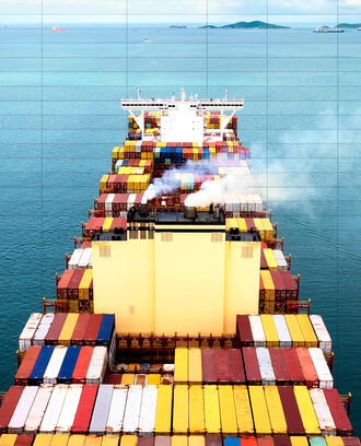 A cargo ship sails in the sea with emissions. A spreadsheet is overlayed on top.