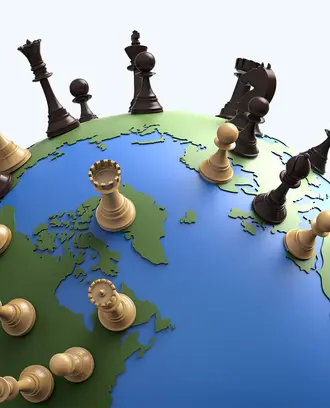 The world globe covered in chess pieces