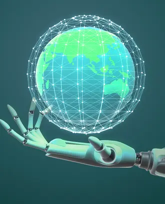 A robot hand holds a world globe