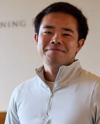 Patrick Yeung smiles at the camera