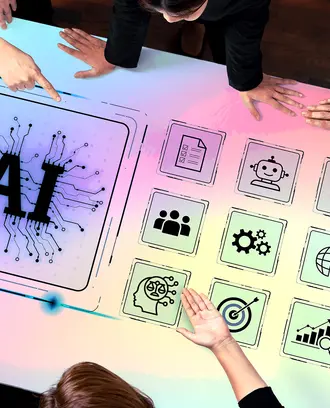 Employees surround a table with various AI graphics