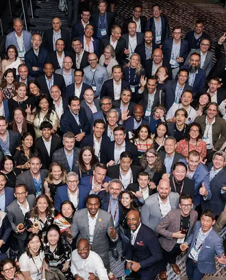 Large group of people pose for photo