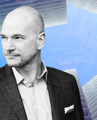 Andrew McAfee and buildings forming an arrow with code