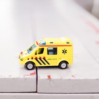 yellow toy ambulance