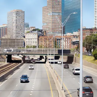 Cars going in and out of Boston via the highway.