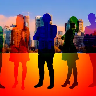 Silhouettes of business people in a rainbow of colors set to the backdrop of a city.