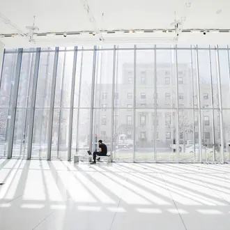 A photo of a student working on campus