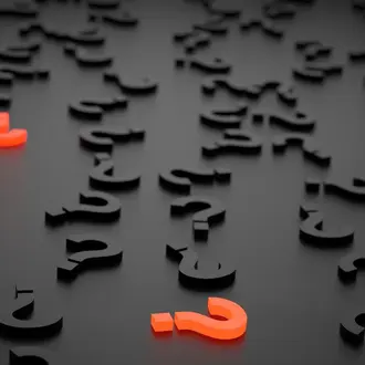 Orange question marks on black background