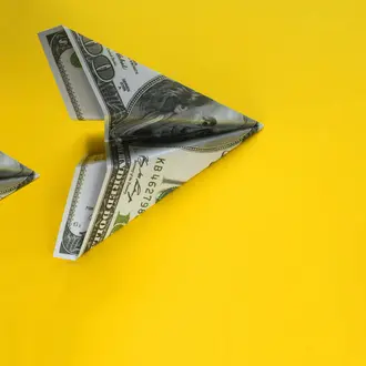 $100 dollar bills made into paper airplanes