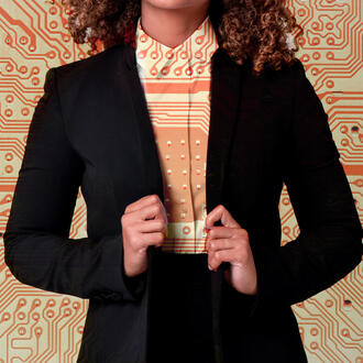 A business person wears a suit with a circuit board pattern