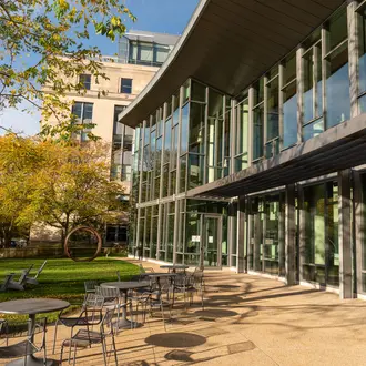 Back of MIT Sloan building on a sunny fall day