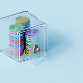 Artificial rainbow coins in a see-through lockbox