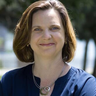 Headshot  of MIT Sloan Professor Erin L. Kelly
