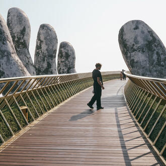 A person alone on the Golden Bridge, Vietnam.